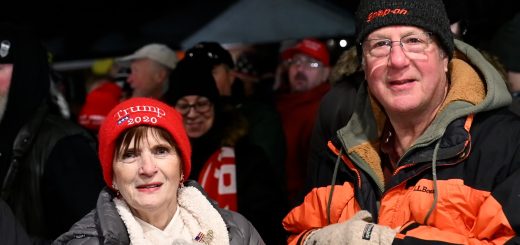 photo of couple waiting for Trump